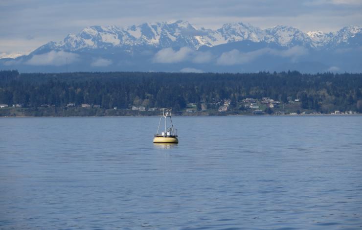 Image of a NANOOS Oceanic Remote Chemical Analyzer (ORCA) buoy which has a PMEL moored pCO2 system installed