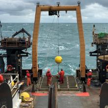 Acoustic Doppler Current Profiler (ADCP) subsurface mooring being deployed off the back of the NOAA Ship Oscar Dyson in the Bering Sea. 